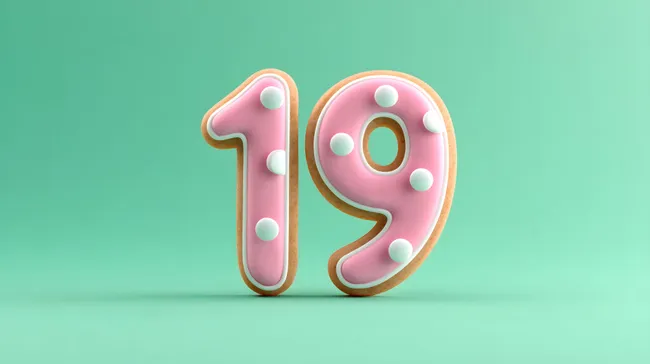 Bunte Zahl 19 aus Gebäck mit Zuckerguss