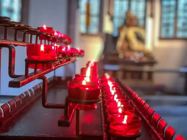 Burning candles in a church