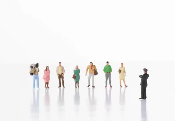 Businessman and group of people on white background