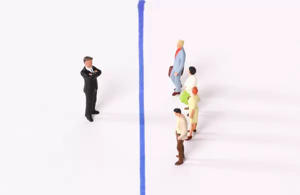 Businessman and group of people with blue line between them