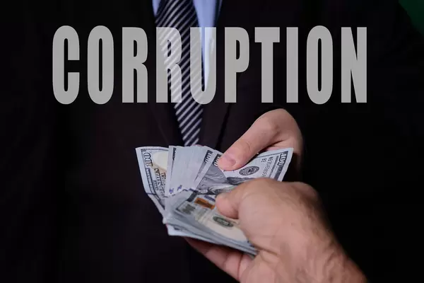 Businessman giving money to goverment official. Anti bribery and corruption concepts