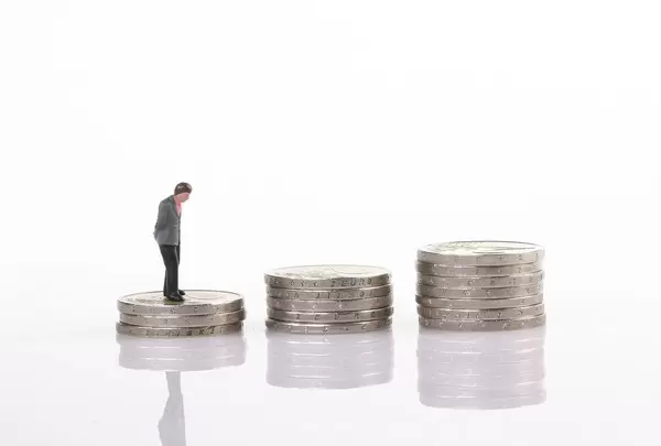 Businessman standing on step of coin money. Concept of Financial and money.