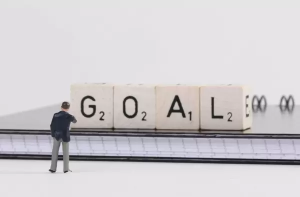 Businessman with goal text