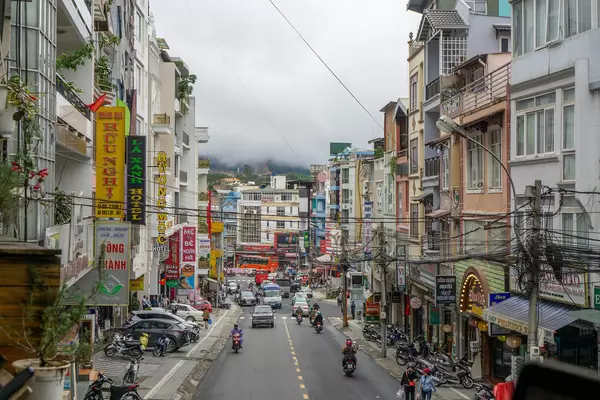 Busy Streets of Dalat, Vietnam with Clouds coming from the Mountains