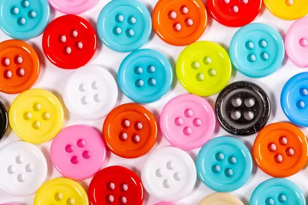 Buttons of different colors on white background (Flip 2019)