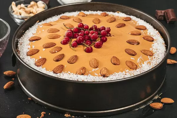 Cake with condensed milk, coconut, nuts and red currant berries (Flip 2019)