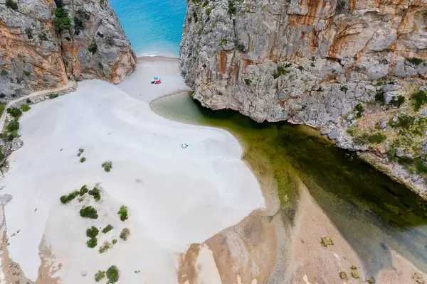 Cala de Sa Calobra beach and the Torrent de Pareis. Wonders of nature on Mallorca seen from the air