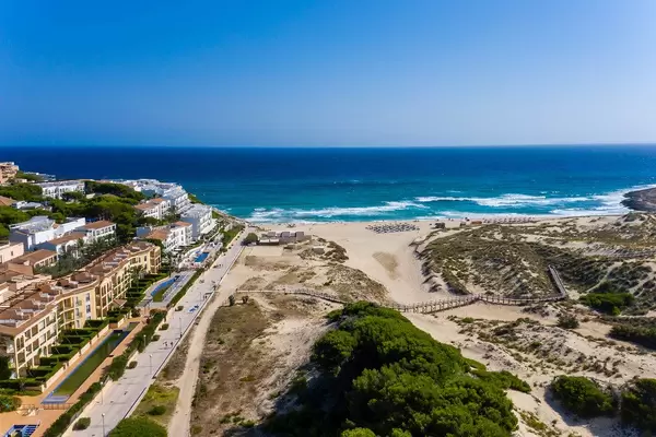 Cala Mesquida: sandy beach and buildings near Capdepera on Mallorca, Balearic islands. Drone pic