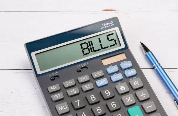 Calculator with the word Bills on the display