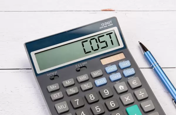 Calculator with the word Cost on the display