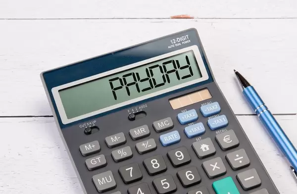 Calculator with the word Payday on the display