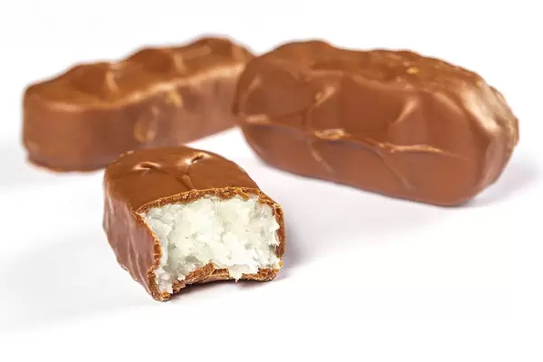 Candy with coconut chips in chocolate