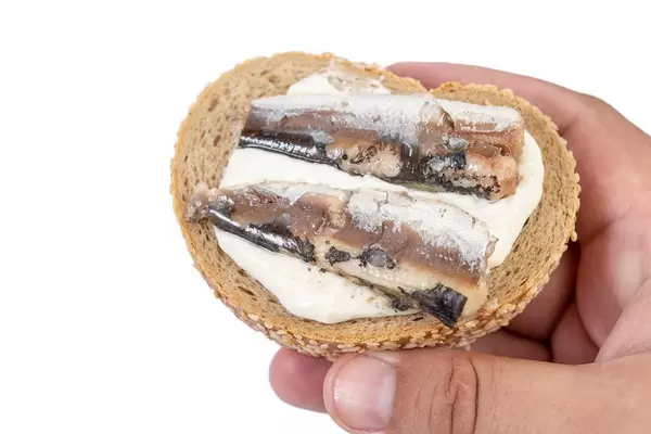 Canned Sardines Fish sandwich in the hand (Flip 2019)