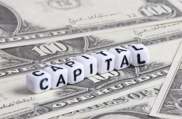 Capital text on Dollar banknotes