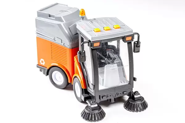Car for cleaning roads and sidewalks on a white background. Children's toy (Flip 2019)