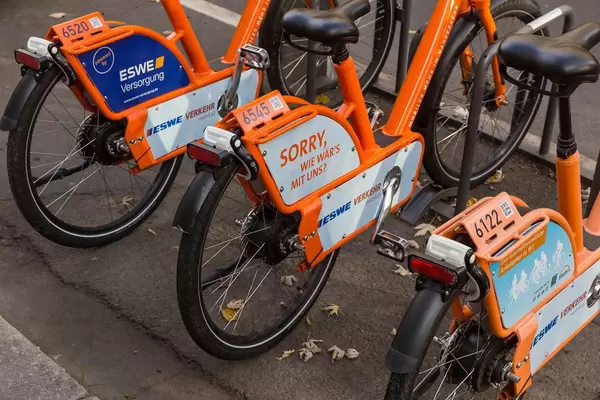 Car-free city: orange bicycles by ESWE - "MeinRad"- public bicycle rent system in Wiesbaden, Germany