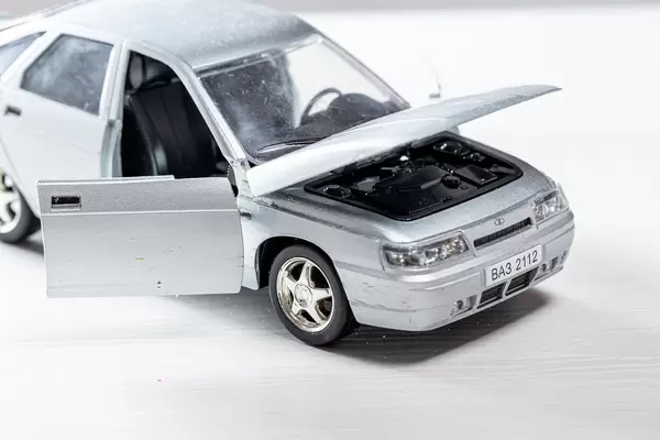 Car toy metal model VAZ 2112 with open doors and hood