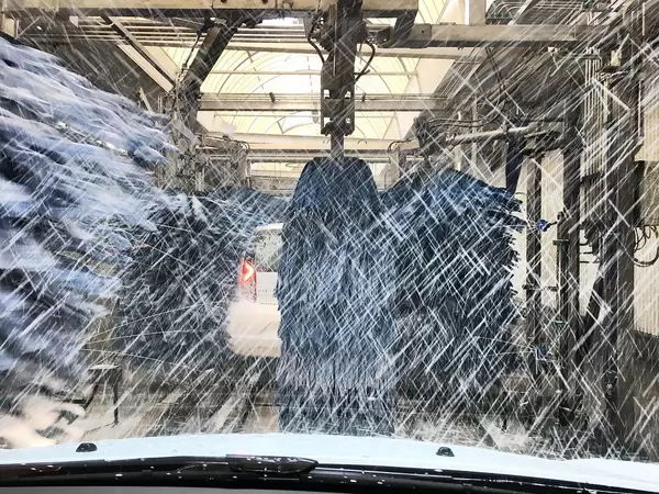 Car wash - inside the car view of brushes in the car washer
