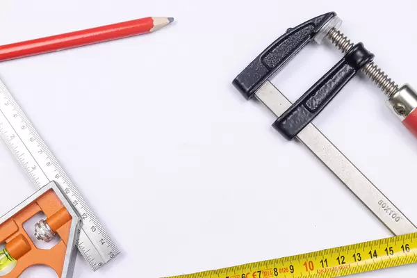 Carpenter Tools above white background with copy space