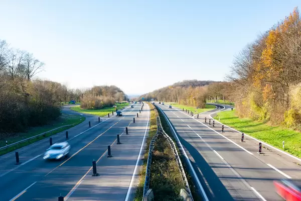 Cars driving through road works part on German Autobahn 1
