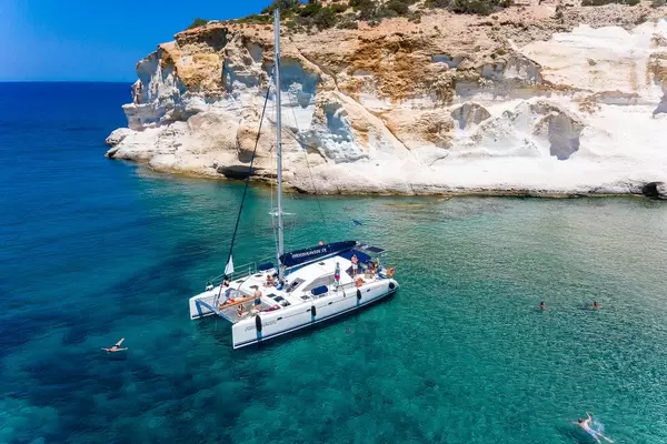 Catamaran tour on the stunning west coast of Milos, where many beaches can only be reached by boat