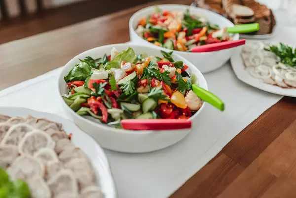Catering Banquet Table With Different Salad Snacks And Appetizers On Wedding