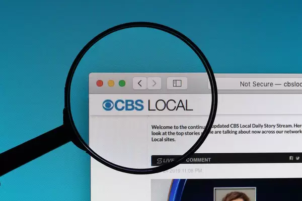 CBS Local logo under magnifying glass