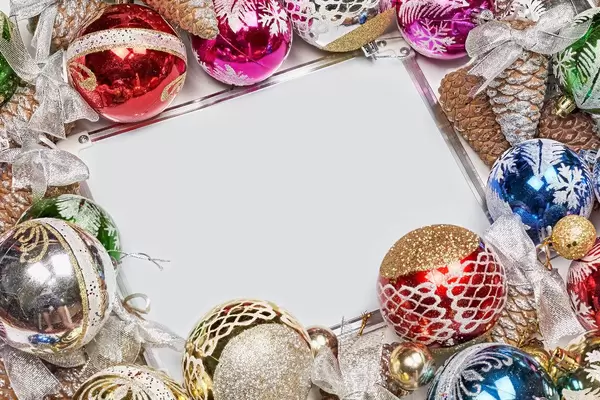 Celebration and holiday composition with decorative Christmas toys and copy space in the middle