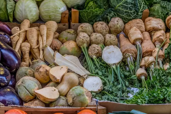 Celery, eggplants and parsley on marketplace