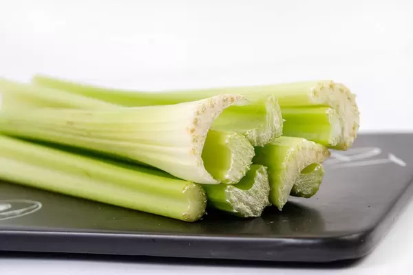 Celery Sticks on the black tray (Flip 2019)