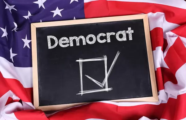 Chalkboard with Democrat text on American flag
