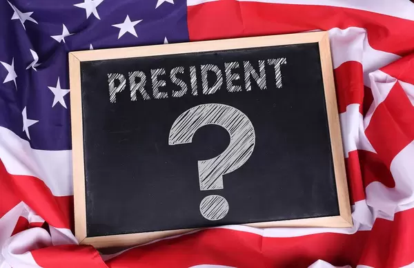 Chalkboard with President text on American flag.jpg