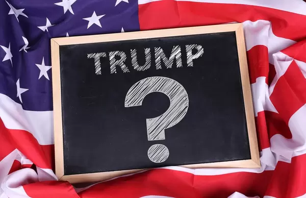 Chalkboard with Trump? text on American flag.jpg