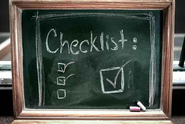 Checklist written on a chalkboard