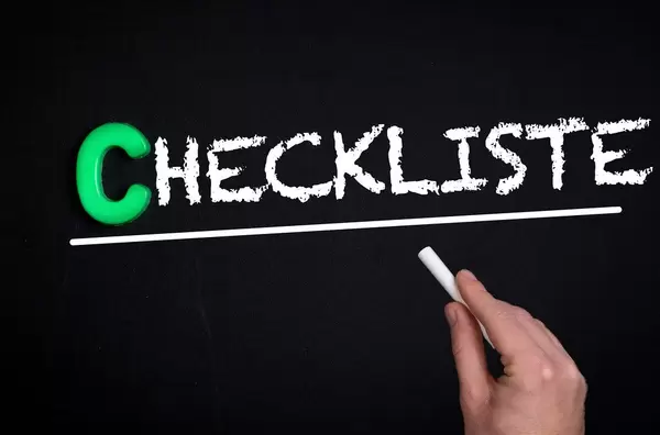 Checkliste text on blackboard
