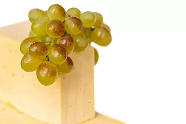 Cheese and fresh green grapes
