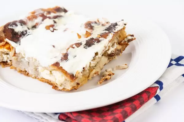 Cheese Pie served on the white plate (Flip 2019)