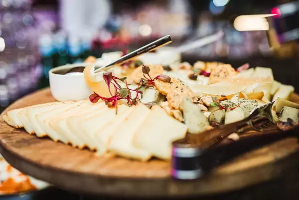 Cheese Plate Asorti With Bokeh Lights (Flip 2019)