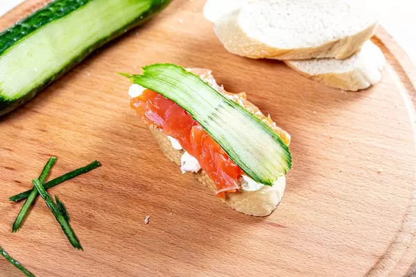 Cheese sandwich, red fish fillet and a piece of fresh cucumber (Flip 2019)