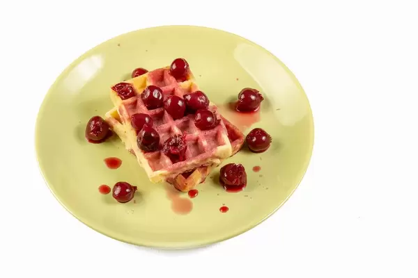 Cherry Compote served with Waffles on the plate (Flip 2019)