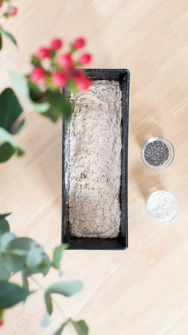 Chia bread dough in a loaf pan