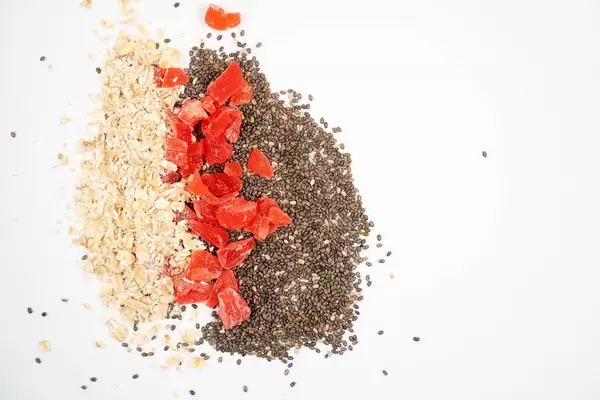 Chia Seeds, Dried Papaya and Oatmeal with copy space (Flip 2020)