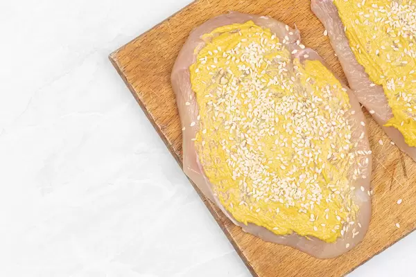 Chicken breasts prepared with Mustard and Sesame