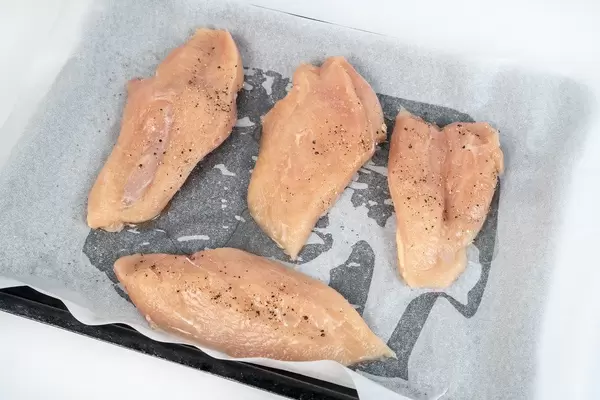 Chicken Breasts with Spices prepared for baking (Flip 2019)