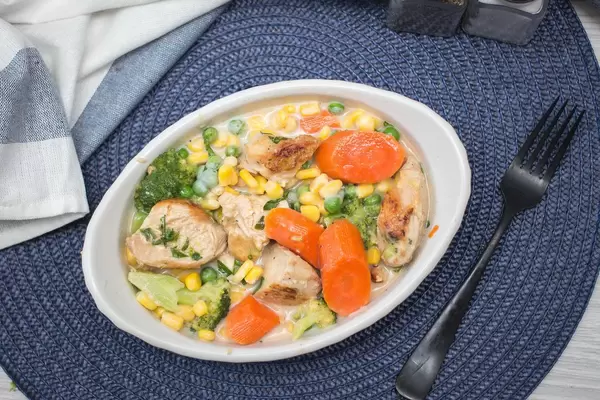 chicken Casserole wiht Carrot, Broccoli and Corn Top View