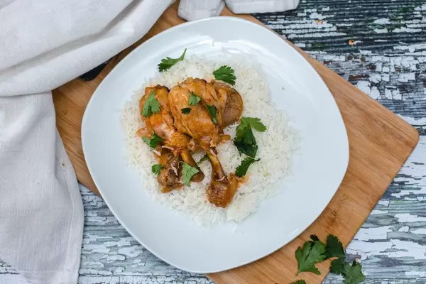 Chicken Drumsticks on White Rice Top View