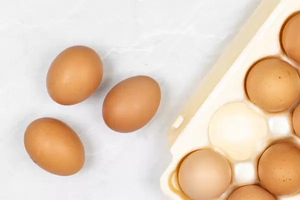 Chicken Eggs in the box and on the table