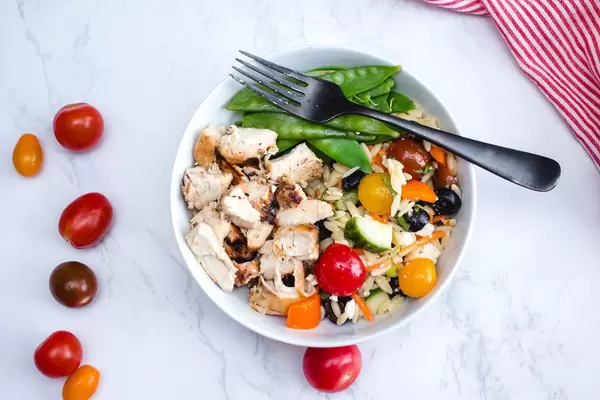 Chicken in a Bowl with Salad and Snow Pea Top View  (Flip 2019)