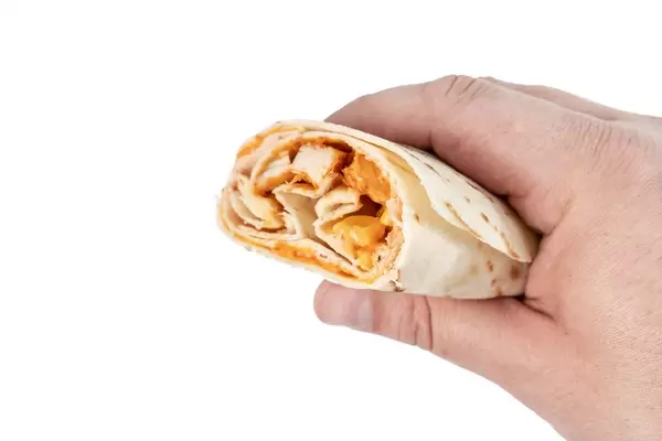 Chicken Meat with Vegetables and Tortilla in the hand (Flip 2019)