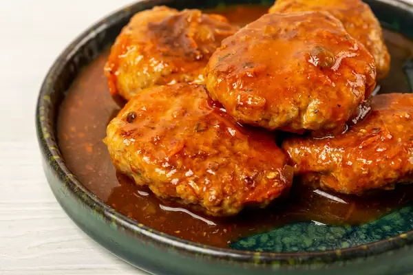 Chicken meatballs with tomato sauce, close-up